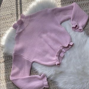 Cropped Pink sweater with peplum detailing